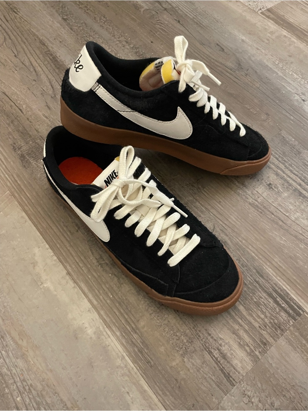 Nike Women’s Black Suede Low-Top Sneakers with White Swoosh and Brown Gum Sole
